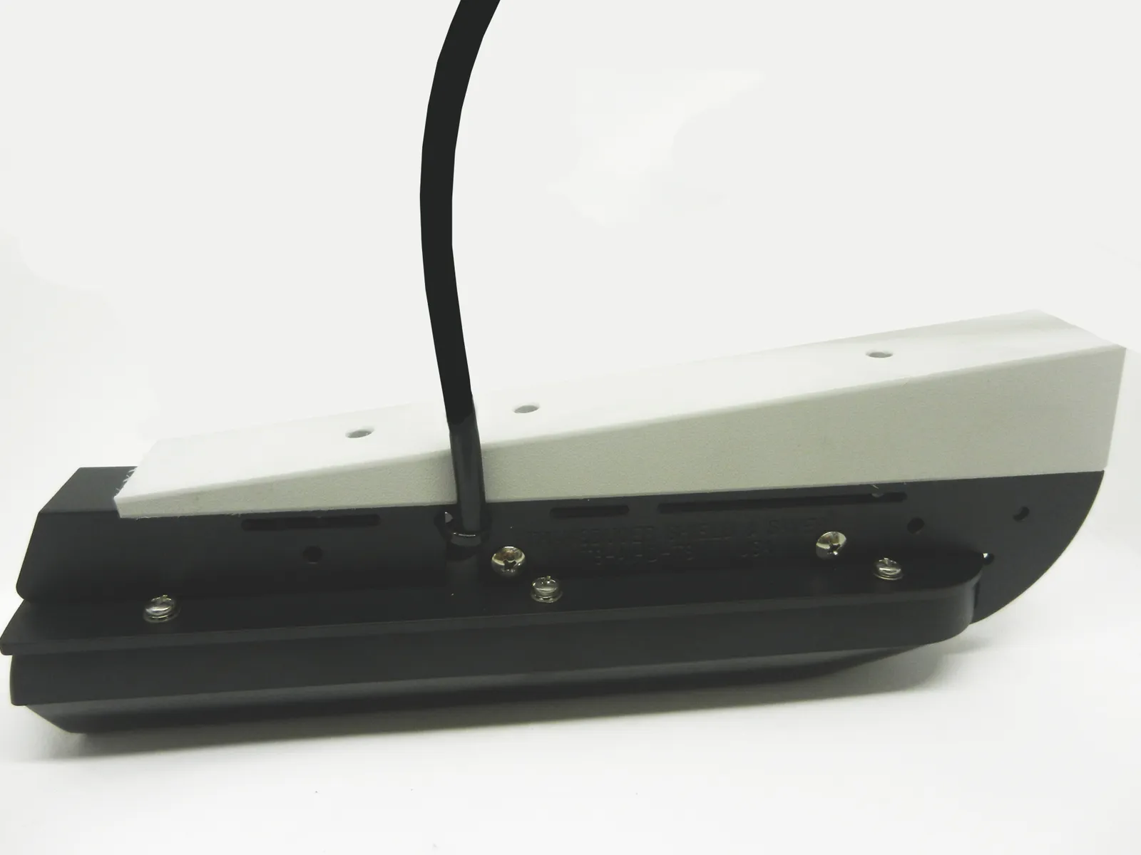 TS-AIHD-TS Picture shows a Polyethylene Wedge attached to Transducer Shield for set back installation